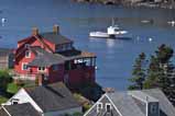 red cabin on water